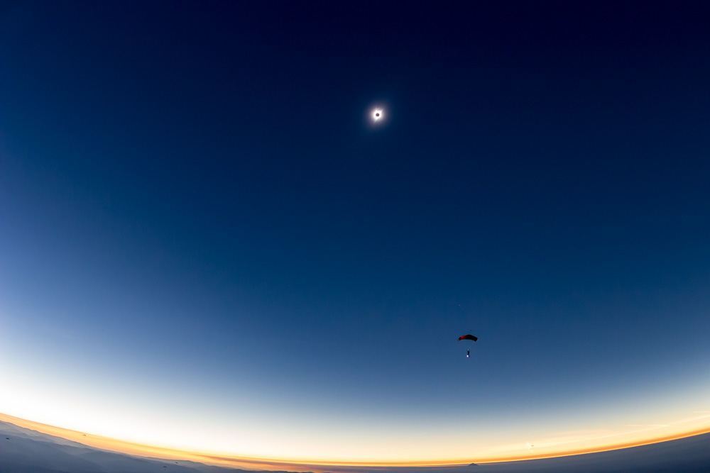 Parachute under Total Solar Eclipse