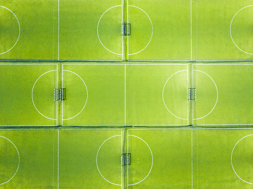 An abstract aerial view of soccer fields