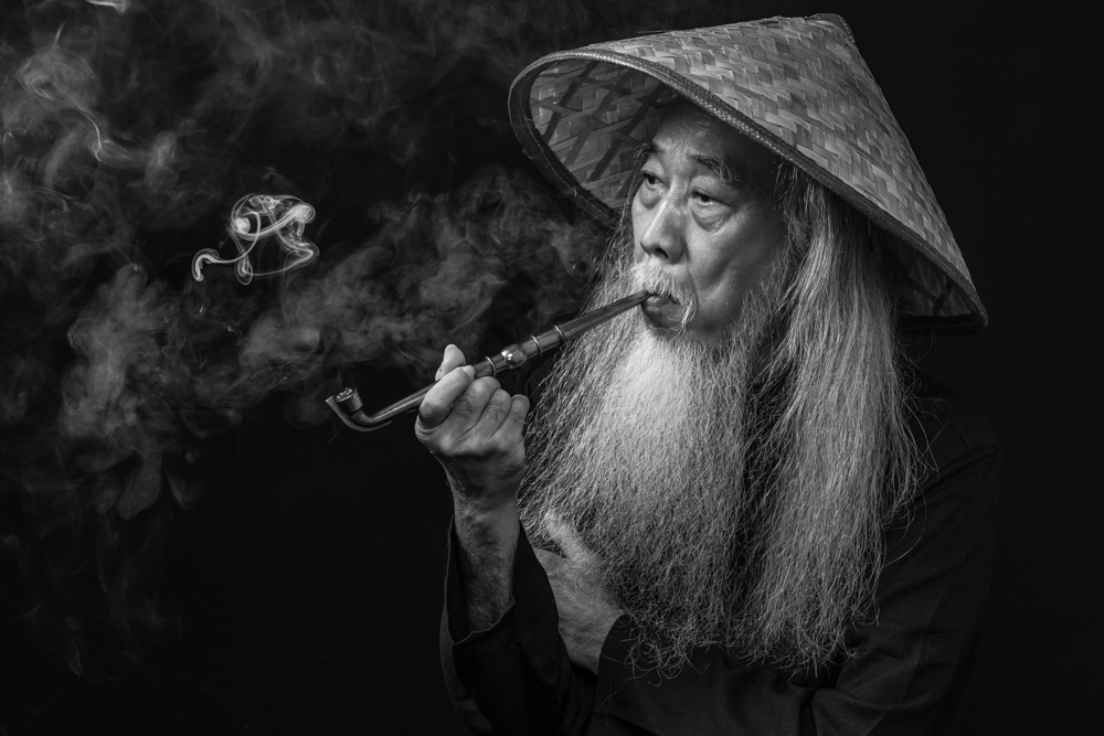 Man Smoking a Pipe