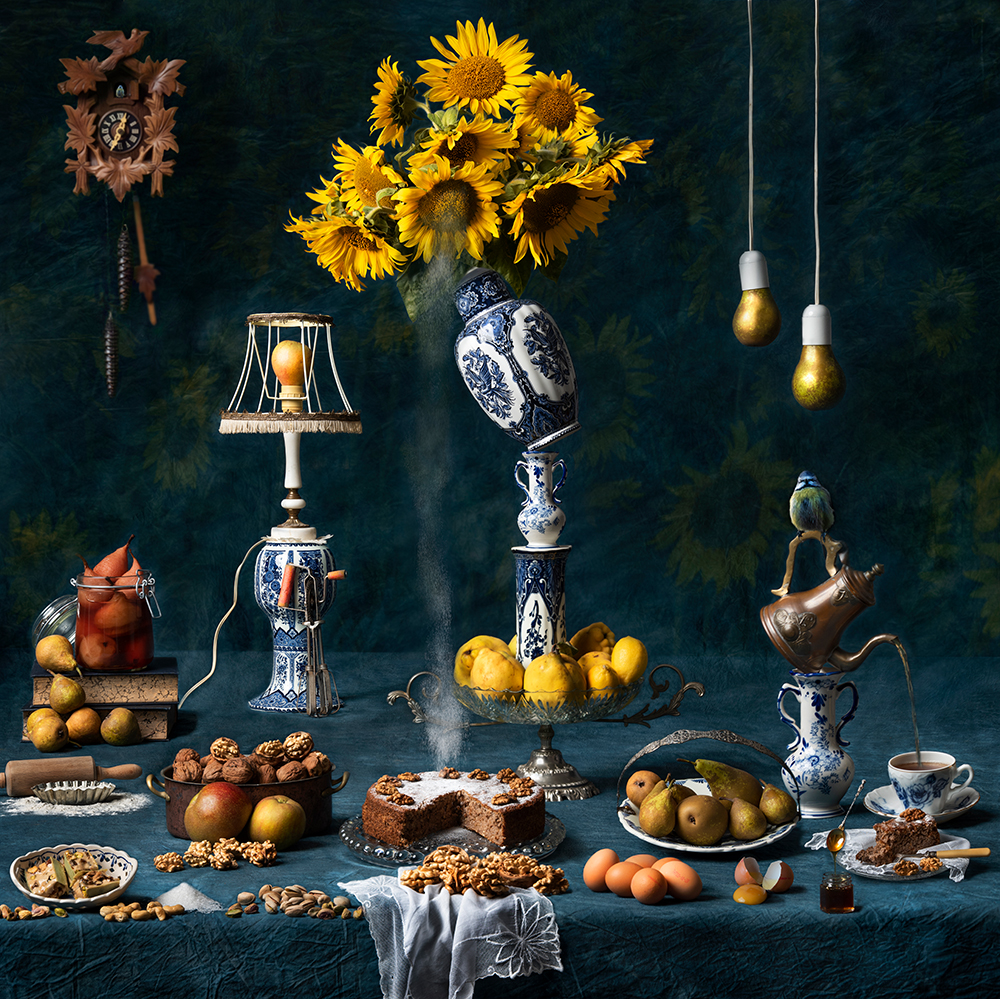 Stillife with Delft blue, sunflowers and pear