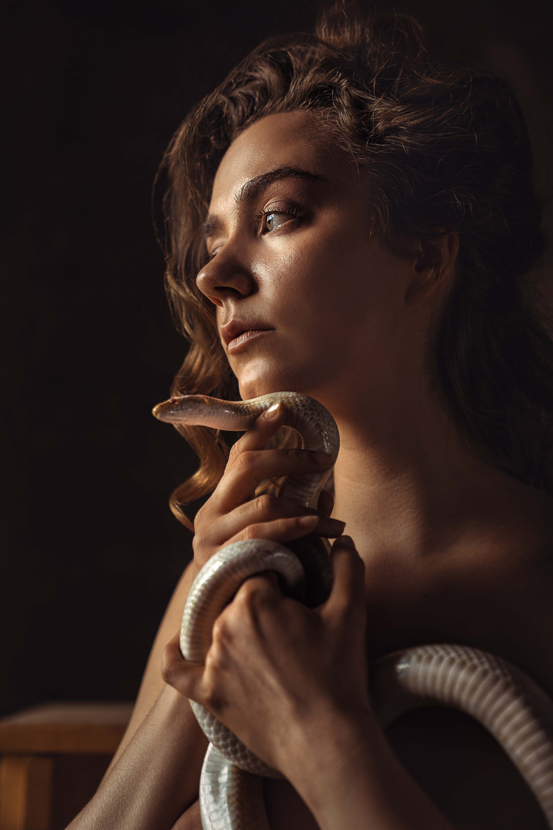 Eva enjoys the snake