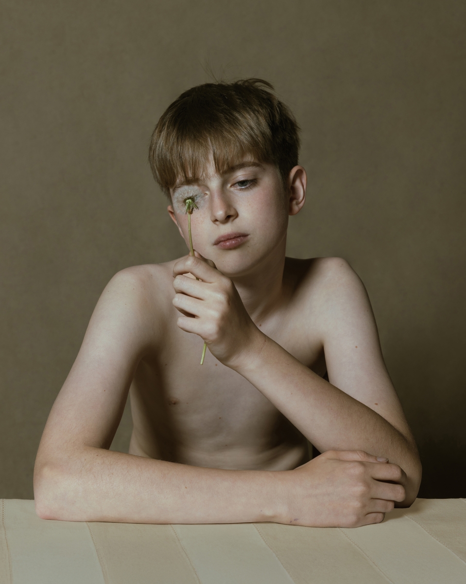 boy with a dandelion