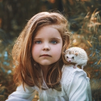 Girl with a hedgehog