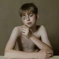 boy with a dandelion